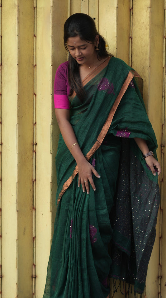 Pure linen saree with sequence work.